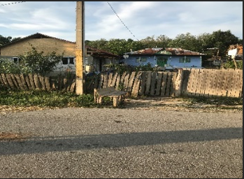 Village homes with wooden fencing